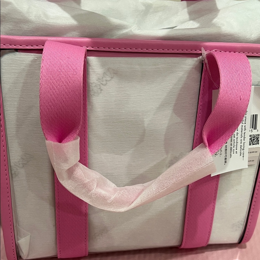 Kate Spade Pink and White Baby Bag